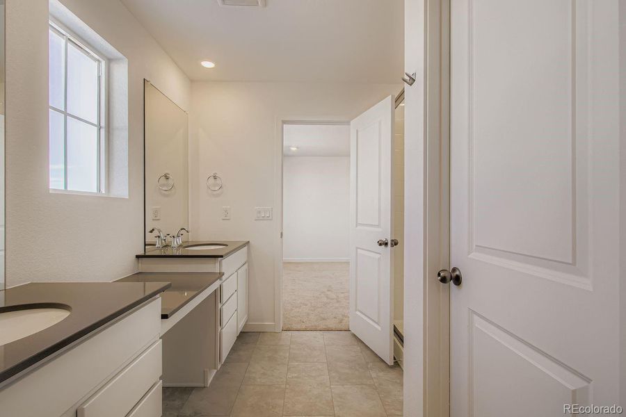 Furnished interior view inside a new home in Ken-Caryl Ranch, Littleton (Image 3).