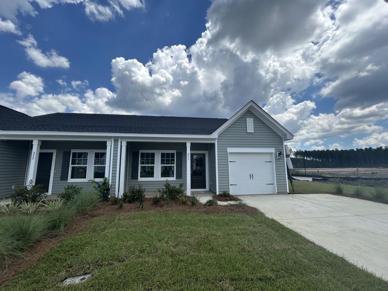 Front exterior of a new home in Hammock Walk at Nexton, Summerville, SC, highlighting curb appeal (Image 2). Front exterior of a new home in Hammock Walk at Nexton, Summerville, SC, highlighting curb appeal (Image 2).