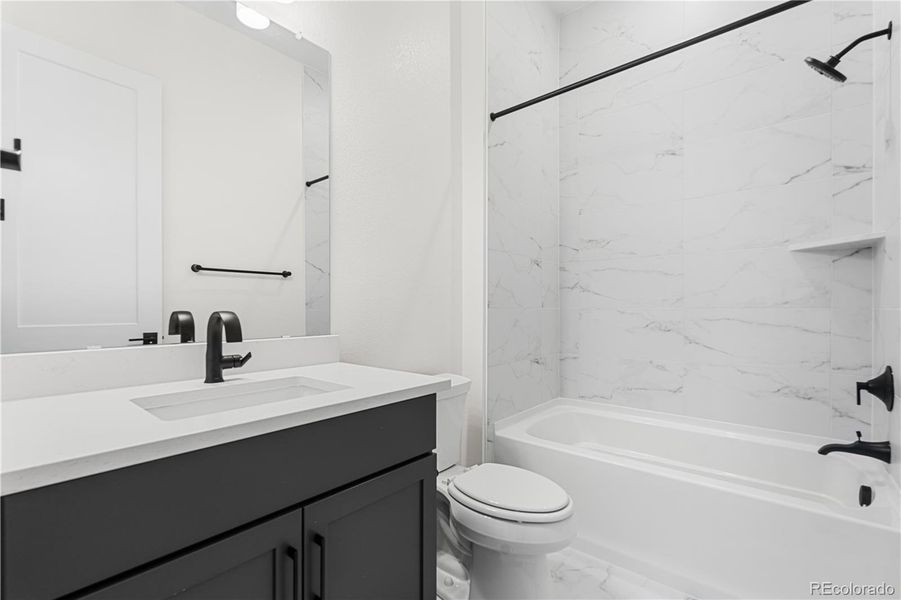 Furnished interior view inside a new home in Reflection at Solstice, Littleton (Image 11).