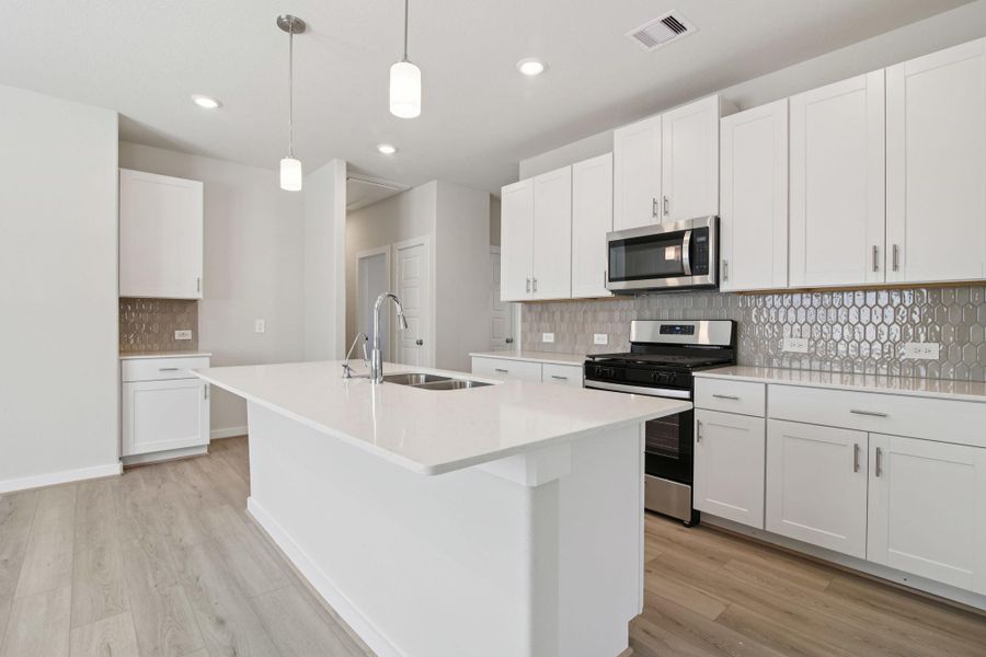 Photo is not of the actual home, but is an inspirational photo of builder’s model home and may depict options, furnishings, and/or decorator features that are not included