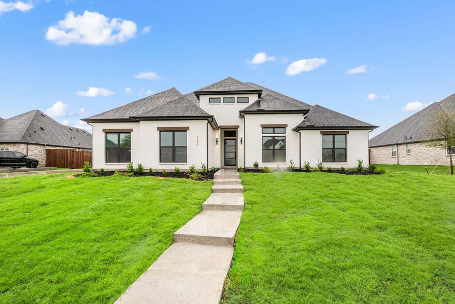 Exterior details and patio area of a home in NorthGlen, Haslet (Image 1).