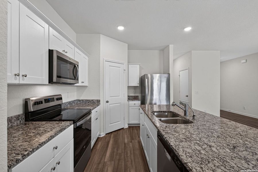 Furnished interior view inside a new home in Hennersby Hollow, San Antonio (Image 6).