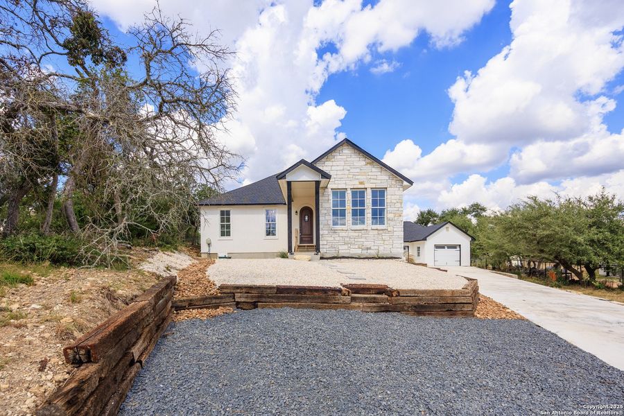 Front exterior of a new home in , Blanco, TX, highlighting curb appeal (Image 30). Front exterior of a new home in , Blanco, TX, highlighting curb appeal (Image 30).