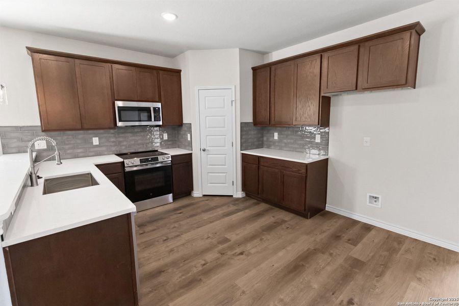 Furnished interior view inside a new home in , Beeville (Image 12). Furnished interior view inside a new home in , Beeville (Image 12).