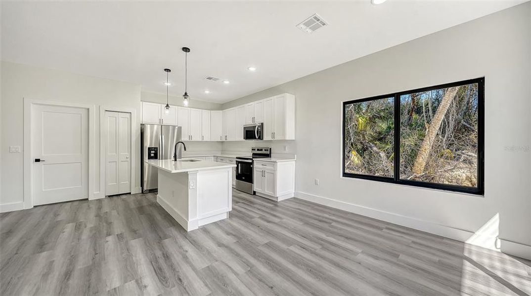 Furnished interior view inside a new home in , North Port (Image 11).
