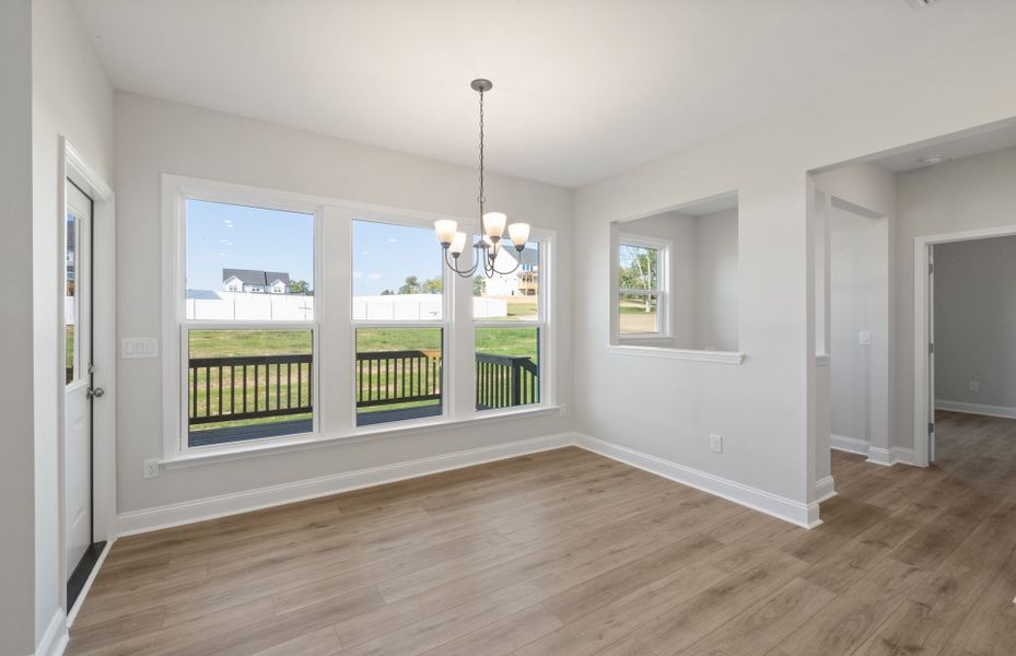Spacious, unfurnished interior of a new home in Browning Stables, Wendell (Image 24).