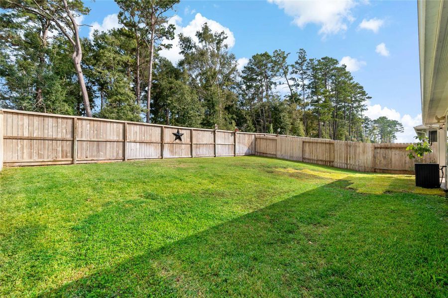 Exterior details and patio area of a home in Harrington Trails at The Canopies, New Caney (Image 19). Exterior details and patio area of a home in Harrington Trails at The Canopies, New Caney (Image 19).