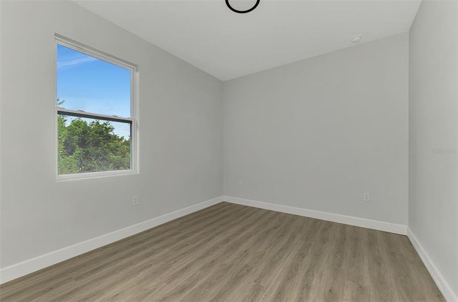 Spacious, unfurnished interior of a new home in , Port Charlotte (Image 23).