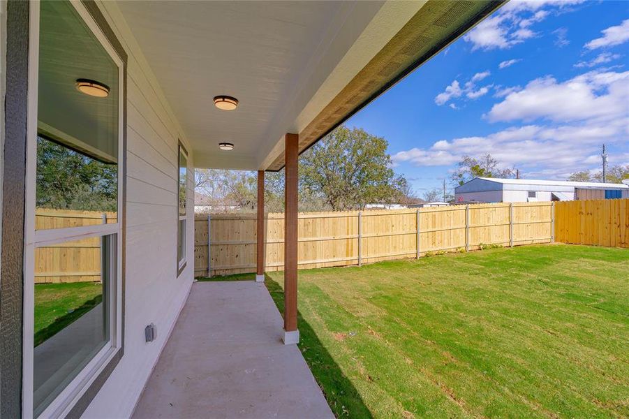 View of yard featuring a patio