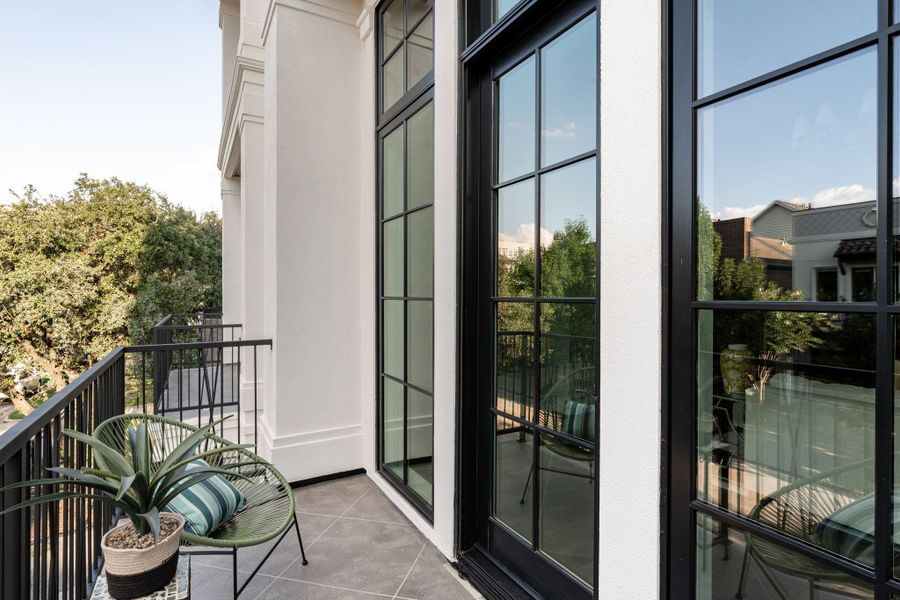 This covered patio off the second-floor family room is perfect for a morning coffee or a sunset cocktail. Careful attention to technical details such as flashing, quality sealants, and slope ensure that your home will stand the test of time. This covered patio off the second-floor family room is perfect for a morning coffee or a sunset cocktail. Careful attention to technical details such as flashing, quality sealants, and slope ensure that your home will stand the test of time.