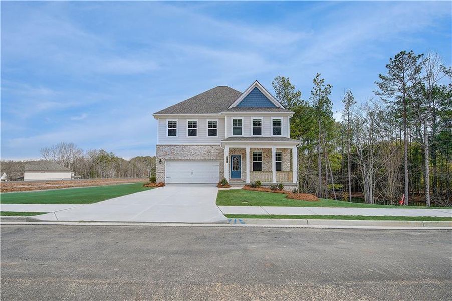 Front exterior of a new home in Hamilton Lakes, Lawrenceville, GA, highlighting curb appeal (Image 18). Front exterior of a new home in Hamilton Lakes, Lawrenceville, GA, highlighting curb appeal (Image 18).