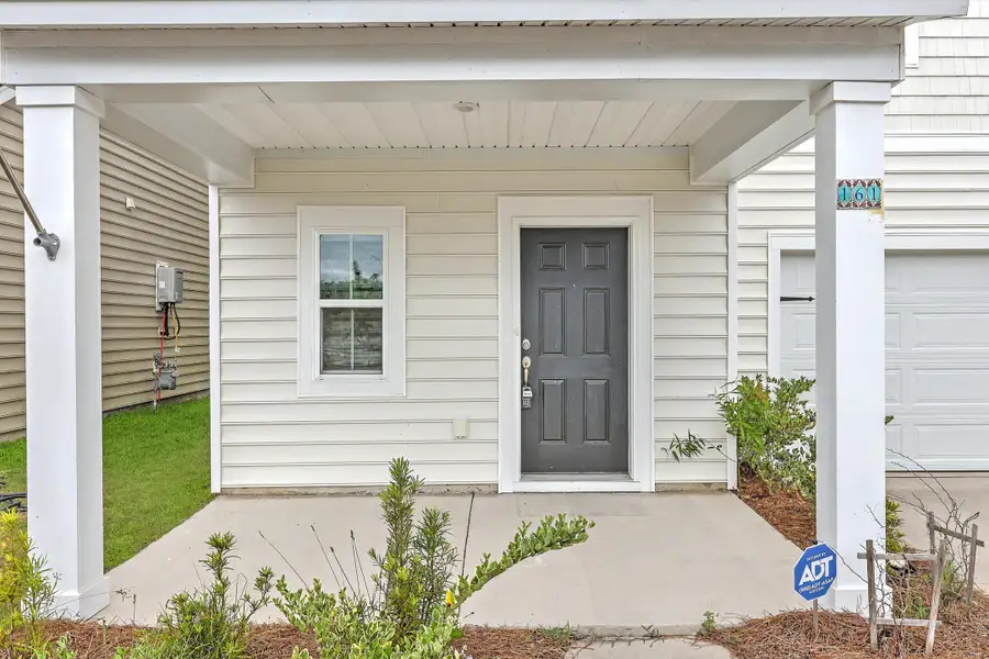 Exterior details and patio area of a home in , Summerville (Image 3).