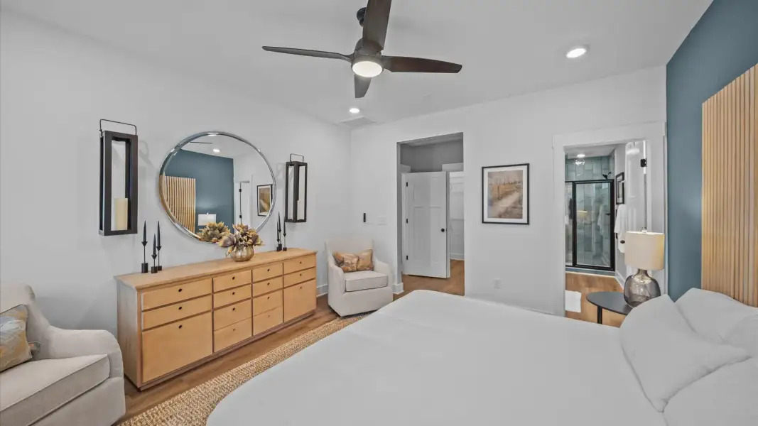 Tasteful main level primary suite featuring modern finishes and superior comfort at Aspen Ridge in Lyman, SC Tasteful main level primary suite featuring modern finishes and superior comfort at Aspen Ridge in Lyman, SC