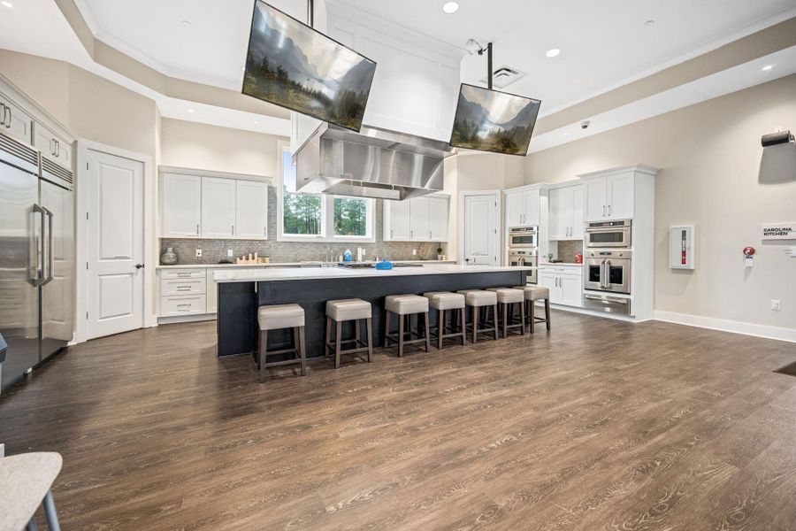 Furnished interior view inside a new home in K. Hovnanian's® Four Seasons at Lakes of Cane Bay, Summerville (Image 34).
