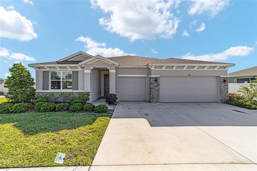 Front exterior of a new home in Brookhaven, Ocala, FL, highlighting curb appeal (Image 26).