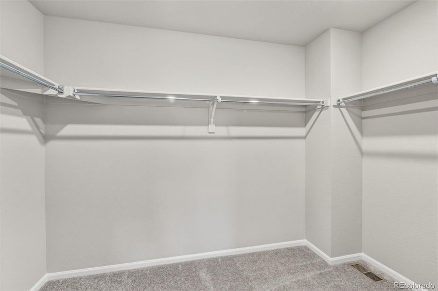 Spacious, unfurnished interior of a new home in Woodrose at Painted Prairie, Aurora (Image 23).