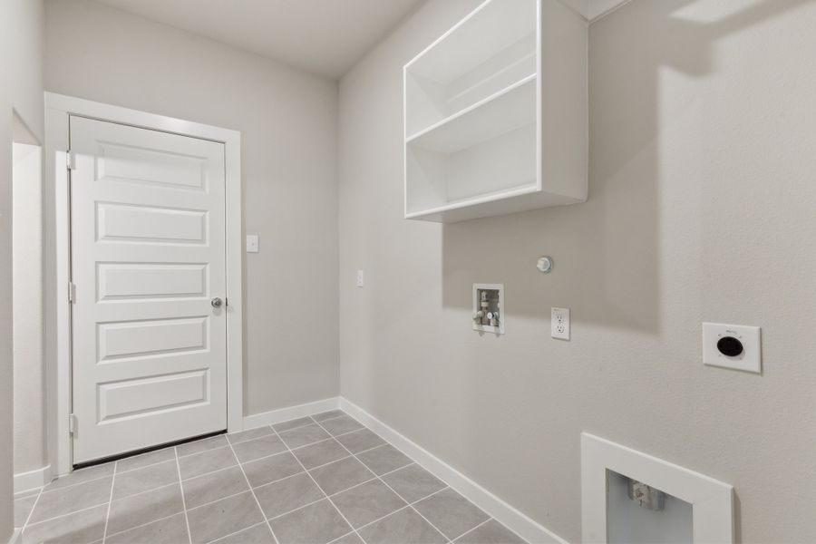 Utility Room in the Claret home plan by Trophy Signature Homes – REPRESENTATIVE PHOTO