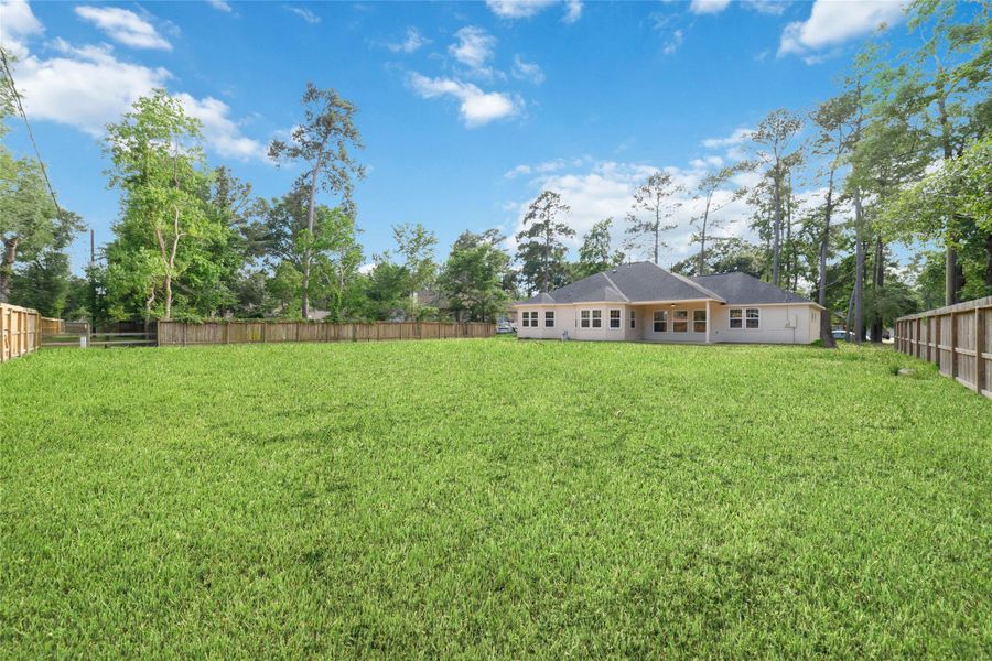 Huge backyard with plenty of space for a pool. This is representative of what it will look like with grass. Currently it is dirt as construction has just been completed. Huge backyard with plenty of space for a pool. This is representative of what it will look like with grass. Currently it is dirt as construction has just been completed.