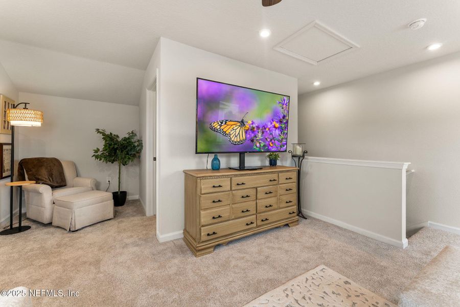 Furnished interior view inside a new home in Seminole Palms Single-Family Homes, Palm Coast (Image 59).