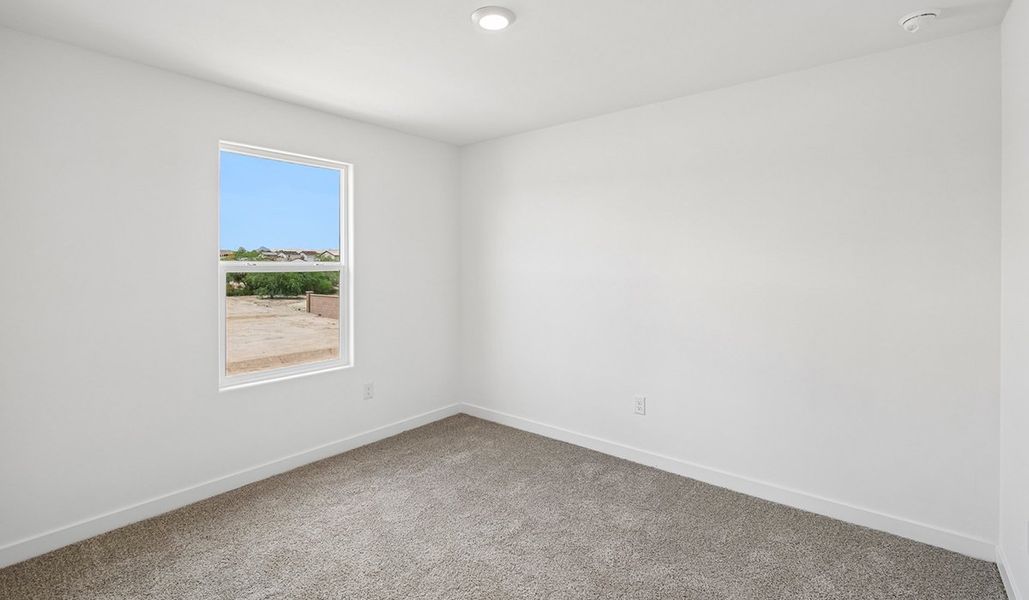 Spacious, unfurnished interior of a new home in The Oasis at Rocking K, Vail (Image 24).