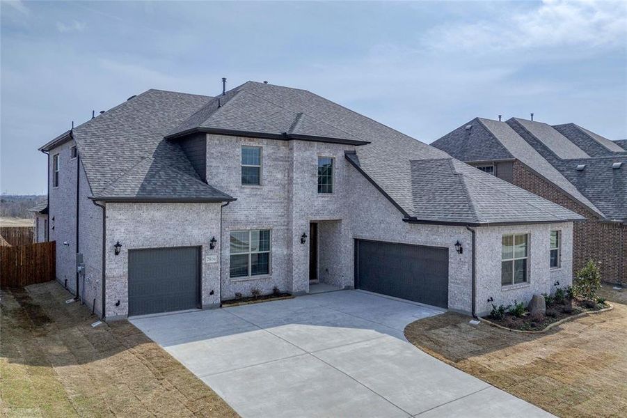Front exterior of a new home in Estates at Baker Park, Sherman, TX, highlighting curb appeal (Image 25).