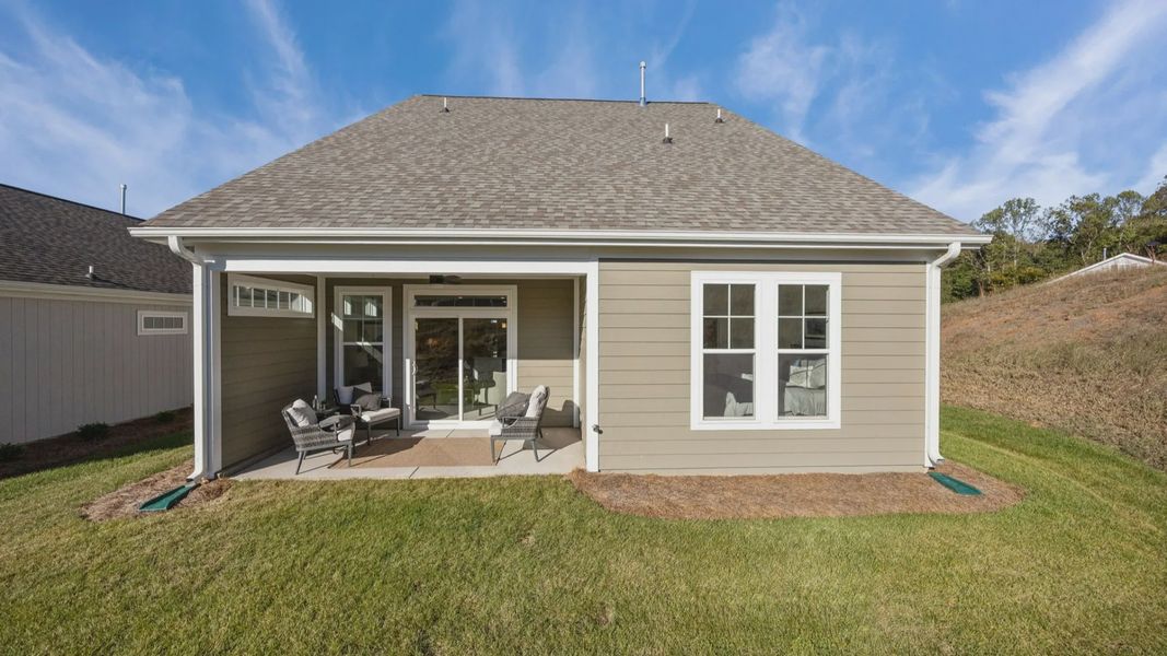 Exterior details and patio area of a home in Village at Maple Leaf Farm, King (Image 4).