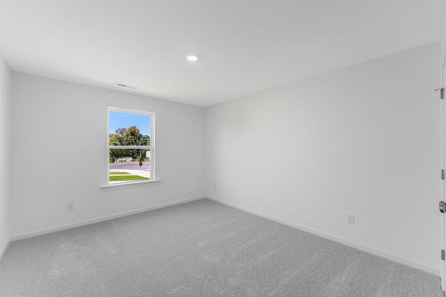 Spacious, unfurnished interior of a new home in Magnolia Townes, Wendell (Image 8).