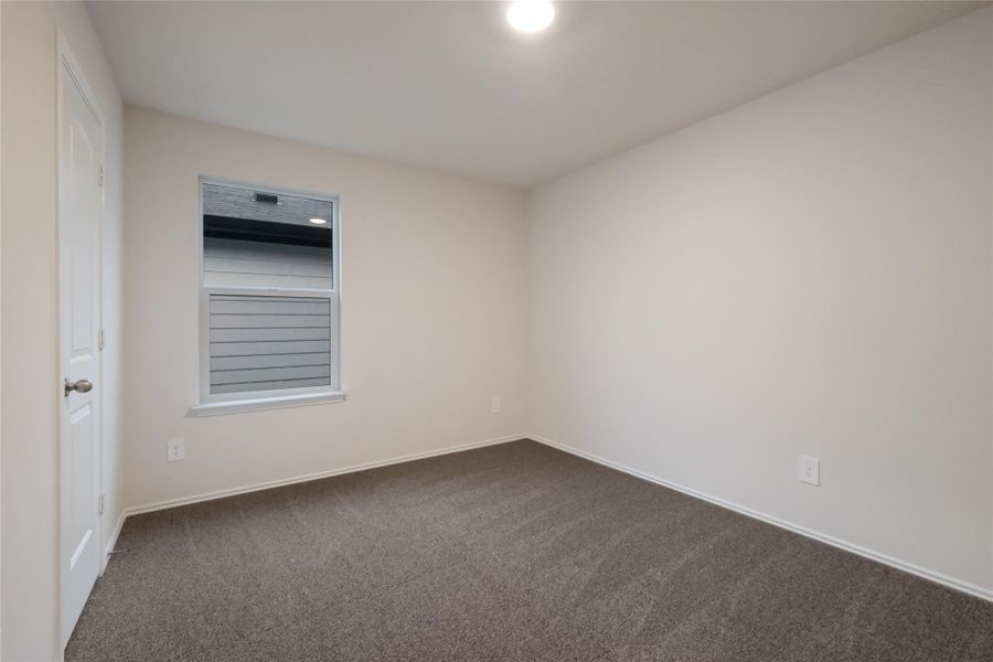 Spacious, unfurnished interior of a new home in Watermill, Uhland (Image 14).