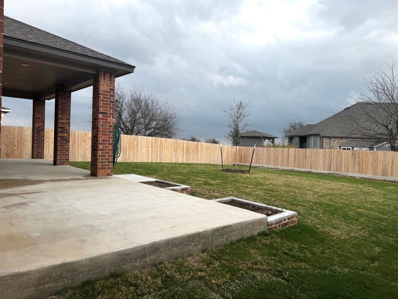 Covered patio with extend so you can have a grill party in your backyard