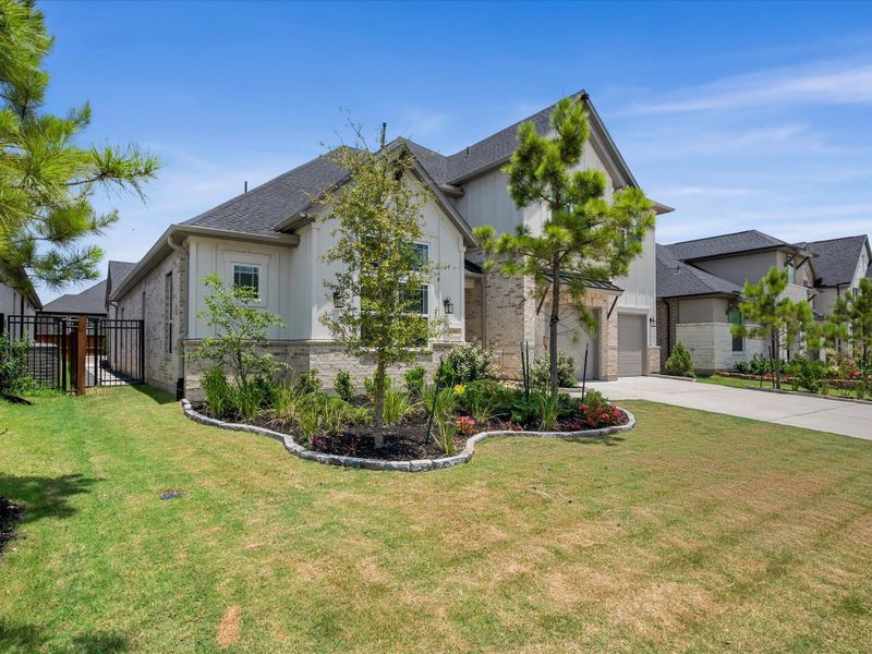 Front exterior of a new home in , Spring, TX, highlighting curb appeal (Image 21).