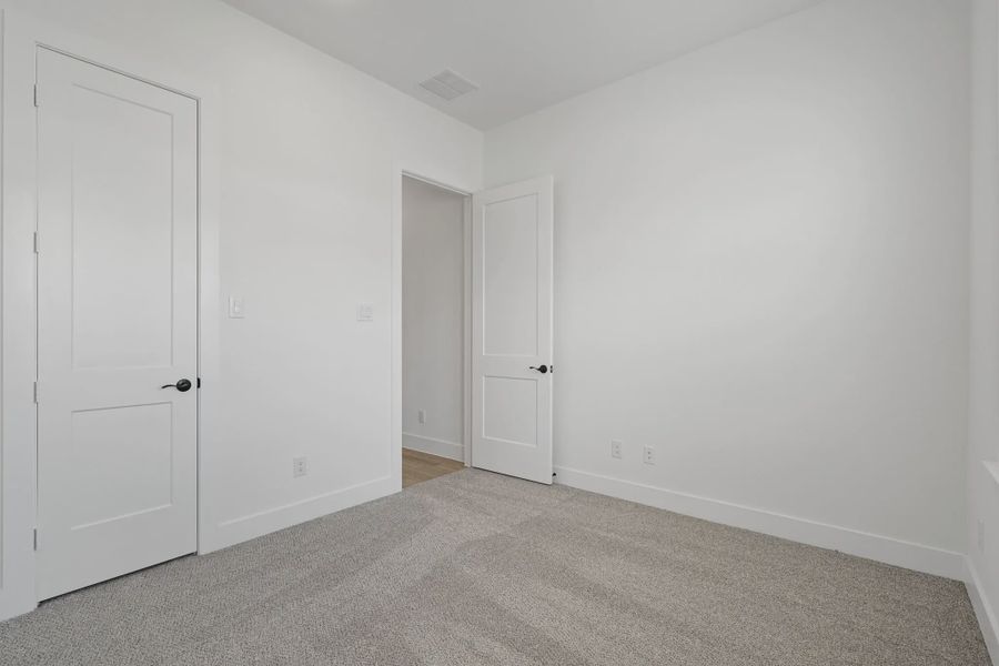 Representative unfurnished interior of a home built from the Malibu by Chesmar Homes in Fulshear Lakes, Fulshear (Image 15).
