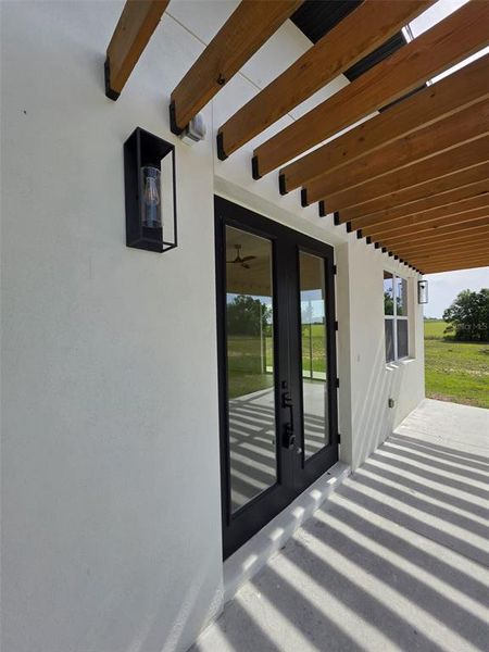 Exterior details and patio area of a home in , Morriston (Image 19).