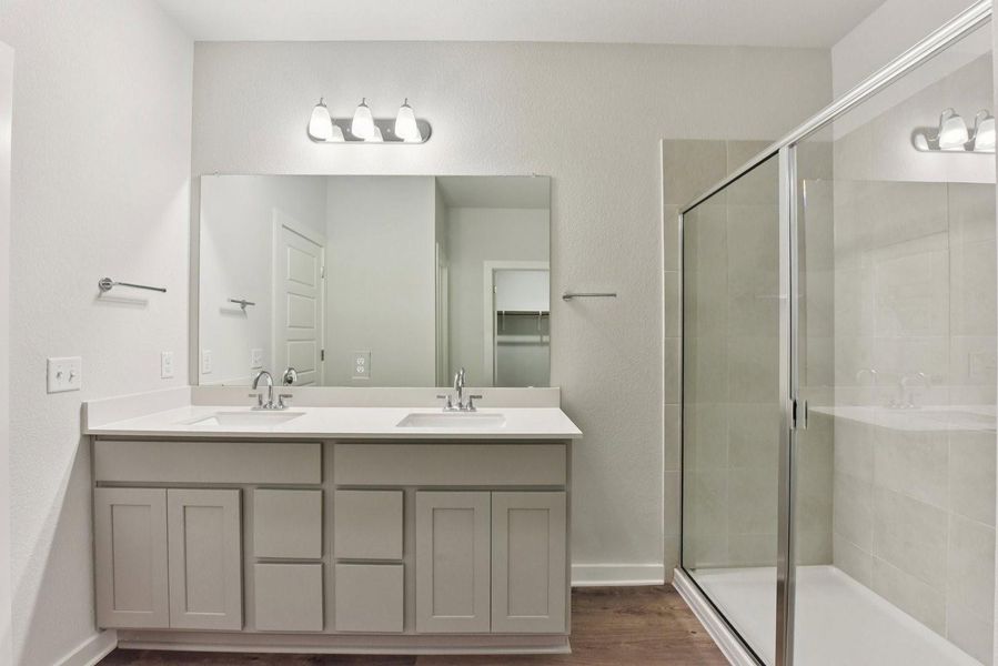 Furnished interior view inside a new home in Stallion Run, Buda (Image 8).