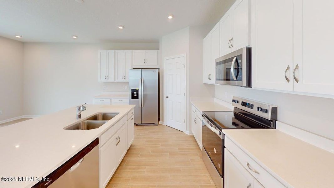 Furnished interior view inside a new home in Sandridge Hills, Green Cove Springs (Image 3).