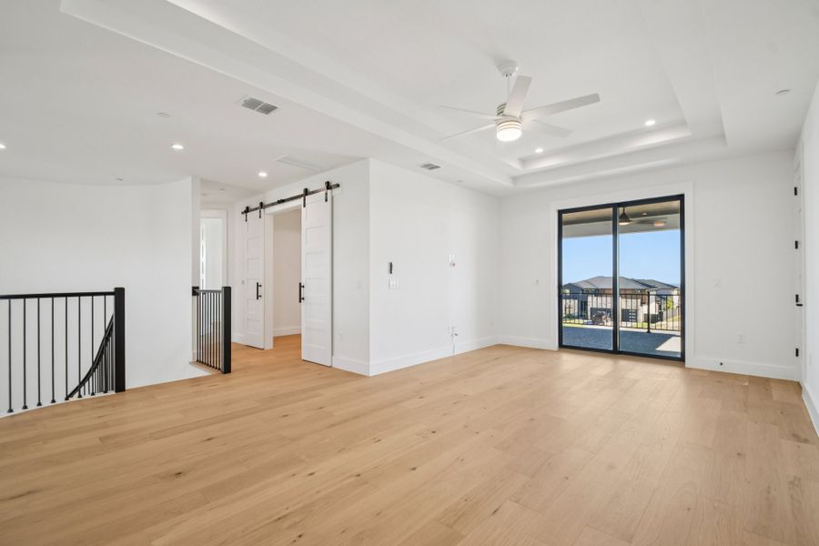 Spacious, unfurnished interior of a new home in Milky Way at River Place, Austin (Image 32).