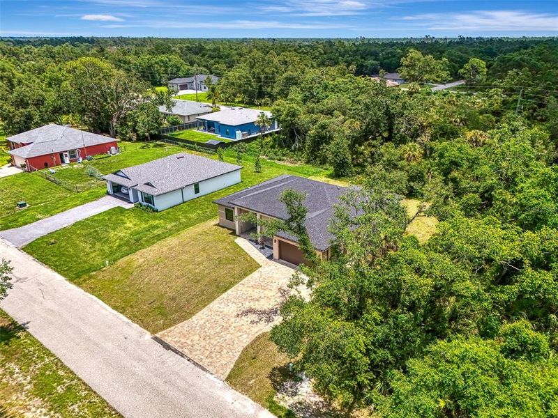 Front exterior of a new home in , Port Charlotte, FL, highlighting curb appeal (Image 29).