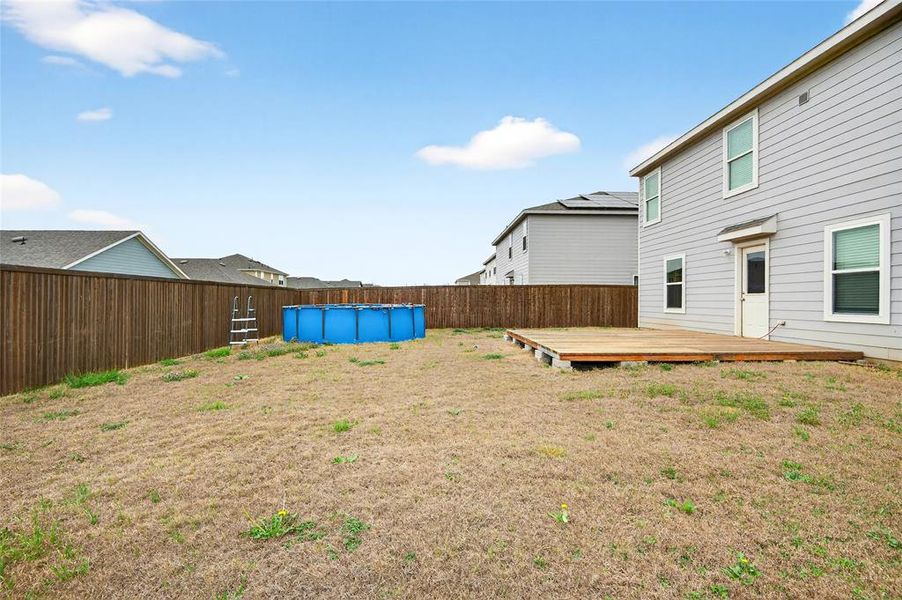Exterior details and patio area of a home in Villages of Mayfield, Cleburne (Image 20).