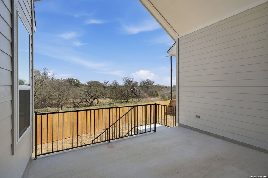 Exterior details and patio area of a home in Potranco Oaks, Castroville (Image 26).