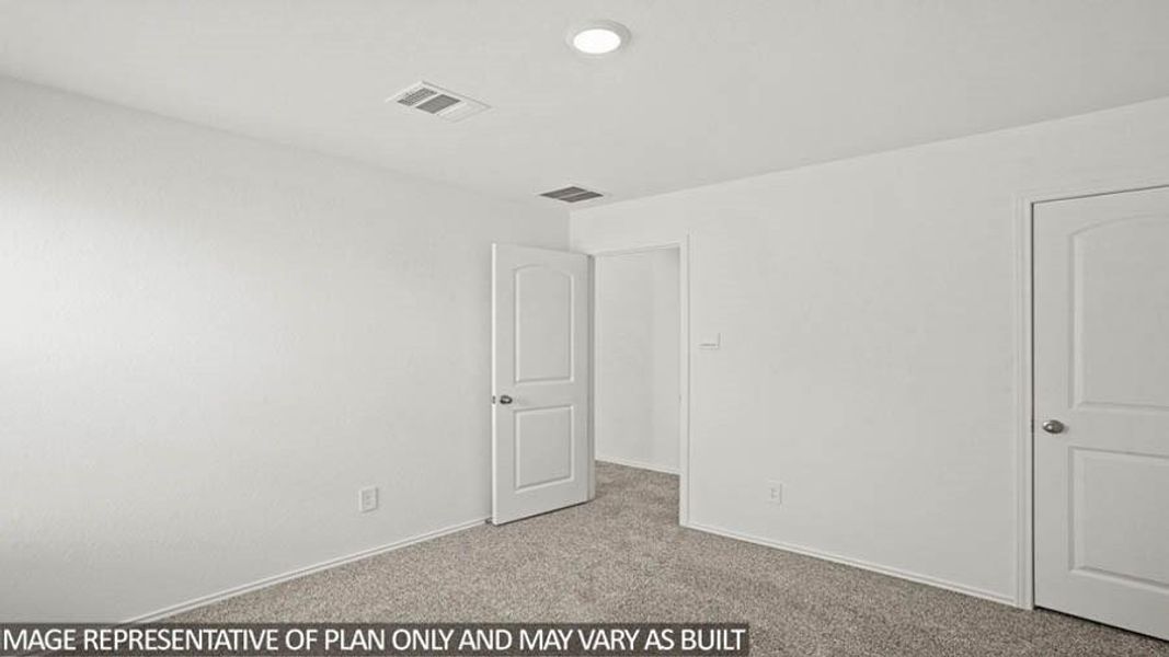 Spacious, unfurnished interior of a new home in Sunterra, Katy (Image 15).