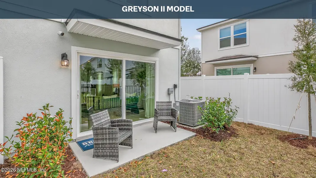 Exterior details and patio area of a home in Irongate Villas, Jacksonville (Image 4).