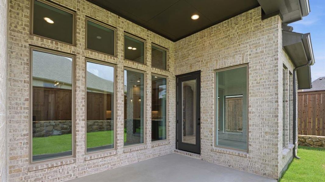 Exterior details and patio area of a home in M3 Ranch, Mansfield (Image 3).