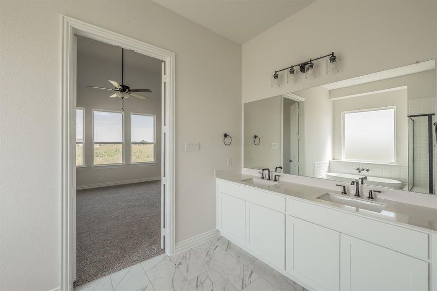 Furnished interior view inside a new home in Matthews Farms, Venus (Image 12).