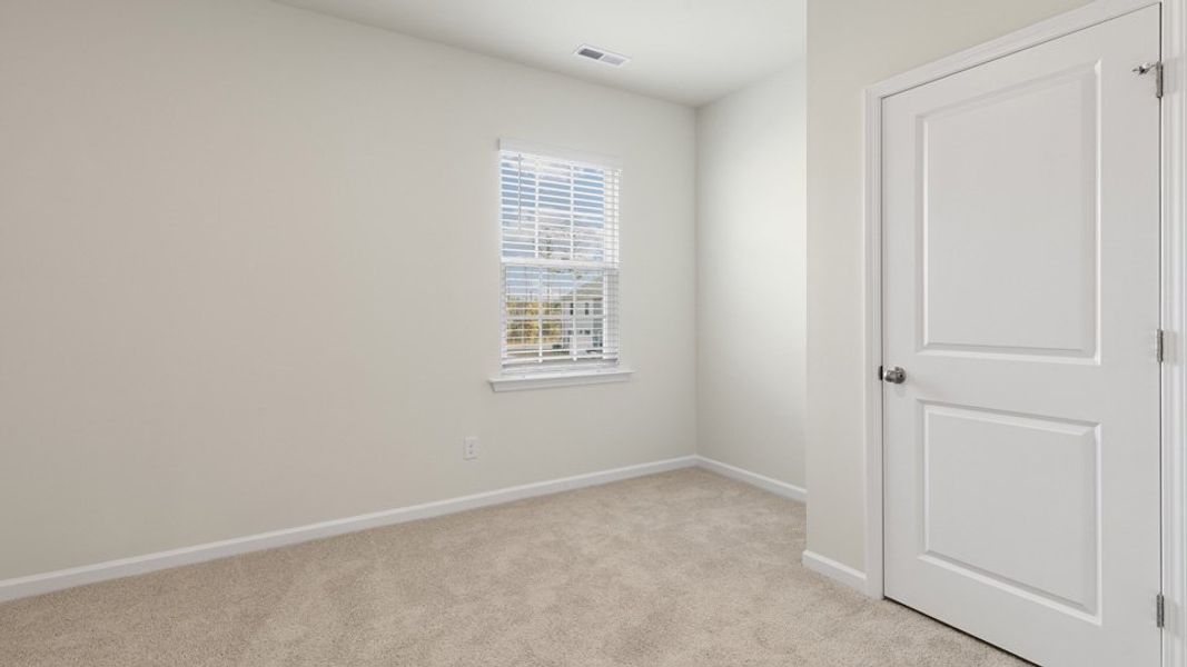Spacious, unfurnished interior of a new home in The Grove at Matthews Landing, Fuquay Varina (Image 18).