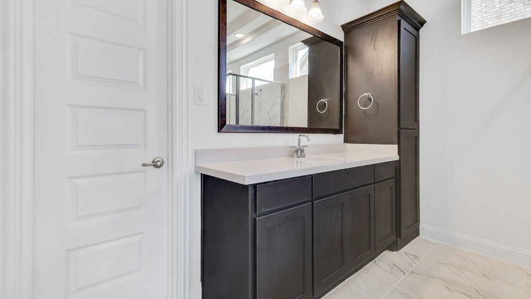 Representative furnished interior of a home built from the Stanford by DRB Homes in Creekhaven, Iowa Colony (Image 13).