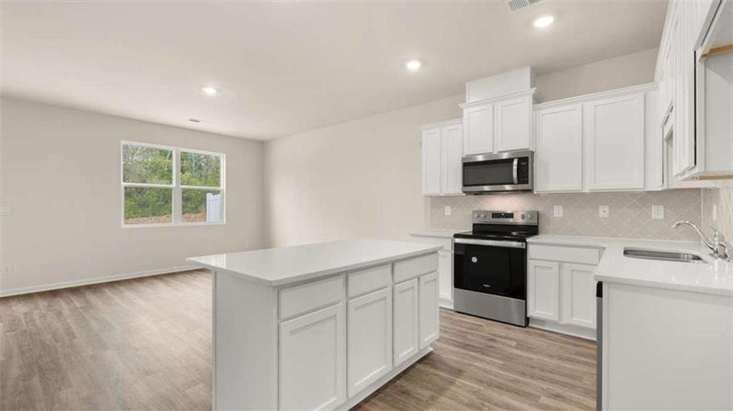 Furnished interior view inside a new home in Young's Crossing, Stone Mountain (Image 3).
