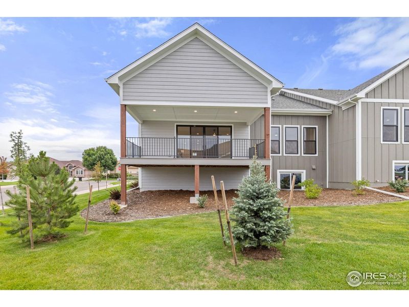 Exterior details and patio area of a home in Cottages at Kelly Farm, Greeley (Image 3).