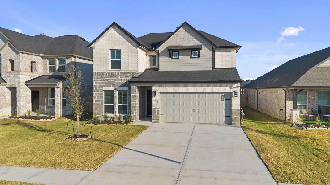 Front exterior of a new home in Morton Creek Ranch, Katy, TX, highlighting curb appeal (Image 14).