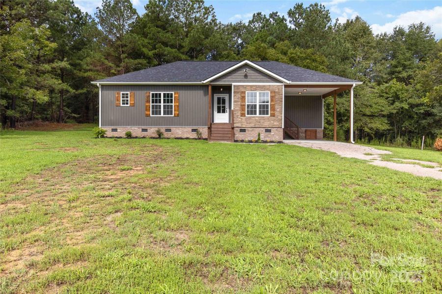 Front exterior of a new home in , Chester, SC, highlighting curb appeal (Image 20).