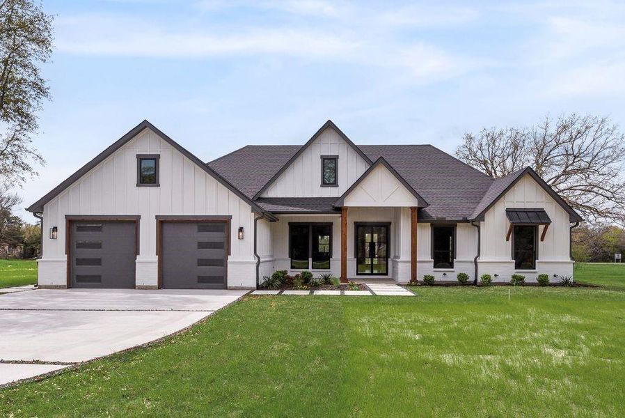 Front exterior of a new home in , Poetry, TX, highlighting curb appeal (Image 1). Front exterior of a new home in , Poetry, TX, highlighting curb appeal (Image 1).