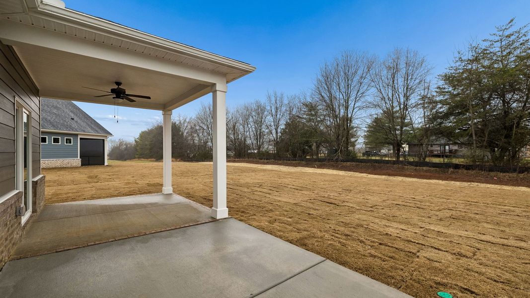 Exterior details and patio area of a home in Reserve at Hickory Ridge, Columbia (Image 30).